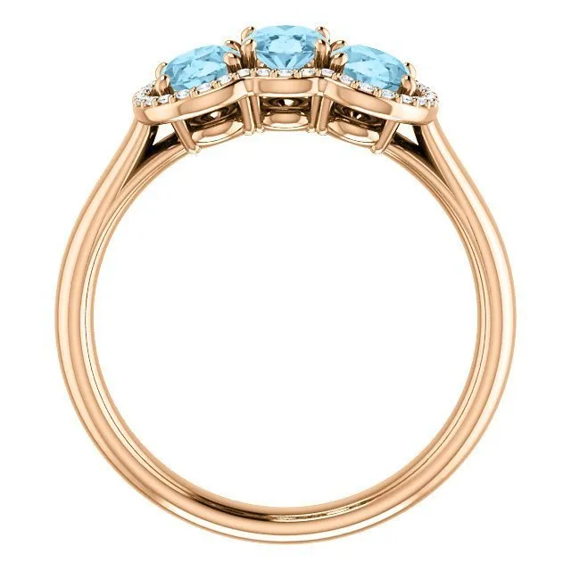 14KT GOLD 1.23 CTW AQUAMARINE & .10 CTW DIAMOND 3 STONE OVAL HALO RING