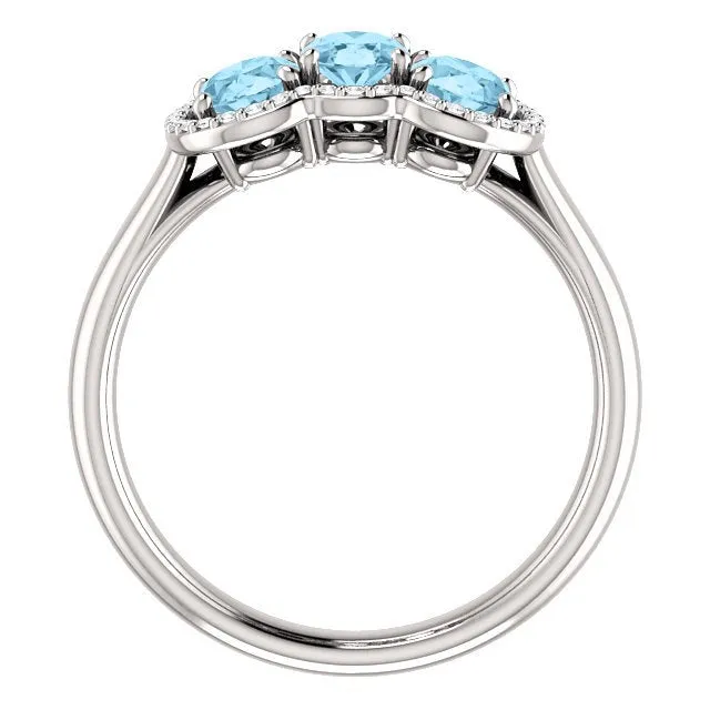 14KT GOLD 1.23 CTW AQUAMARINE & .10 CTW DIAMOND 3 STONE OVAL HALO RING