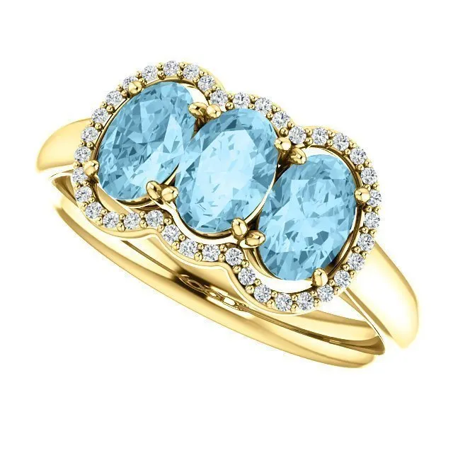 14KT GOLD 1.23 CTW AQUAMARINE & .10 CTW DIAMOND 3 STONE OVAL HALO RING