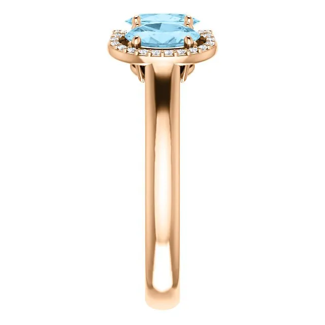 14KT GOLD 1.23 CTW AQUAMARINE & .10 CTW DIAMOND 3 STONE OVAL HALO RING