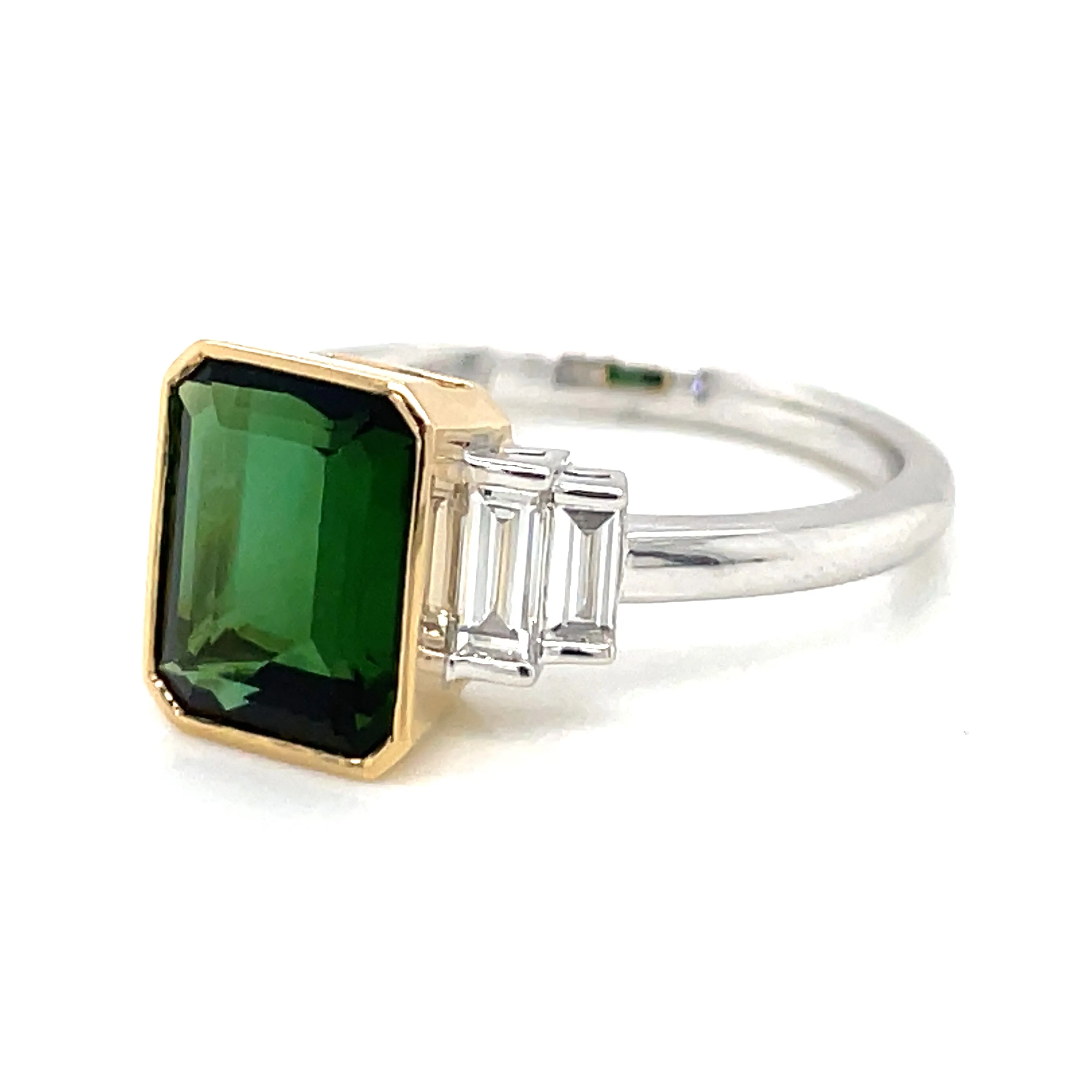 18ct White Gold Earth Grown Emerald Cut Green Tourmaline and Diamond Side Stone Ring