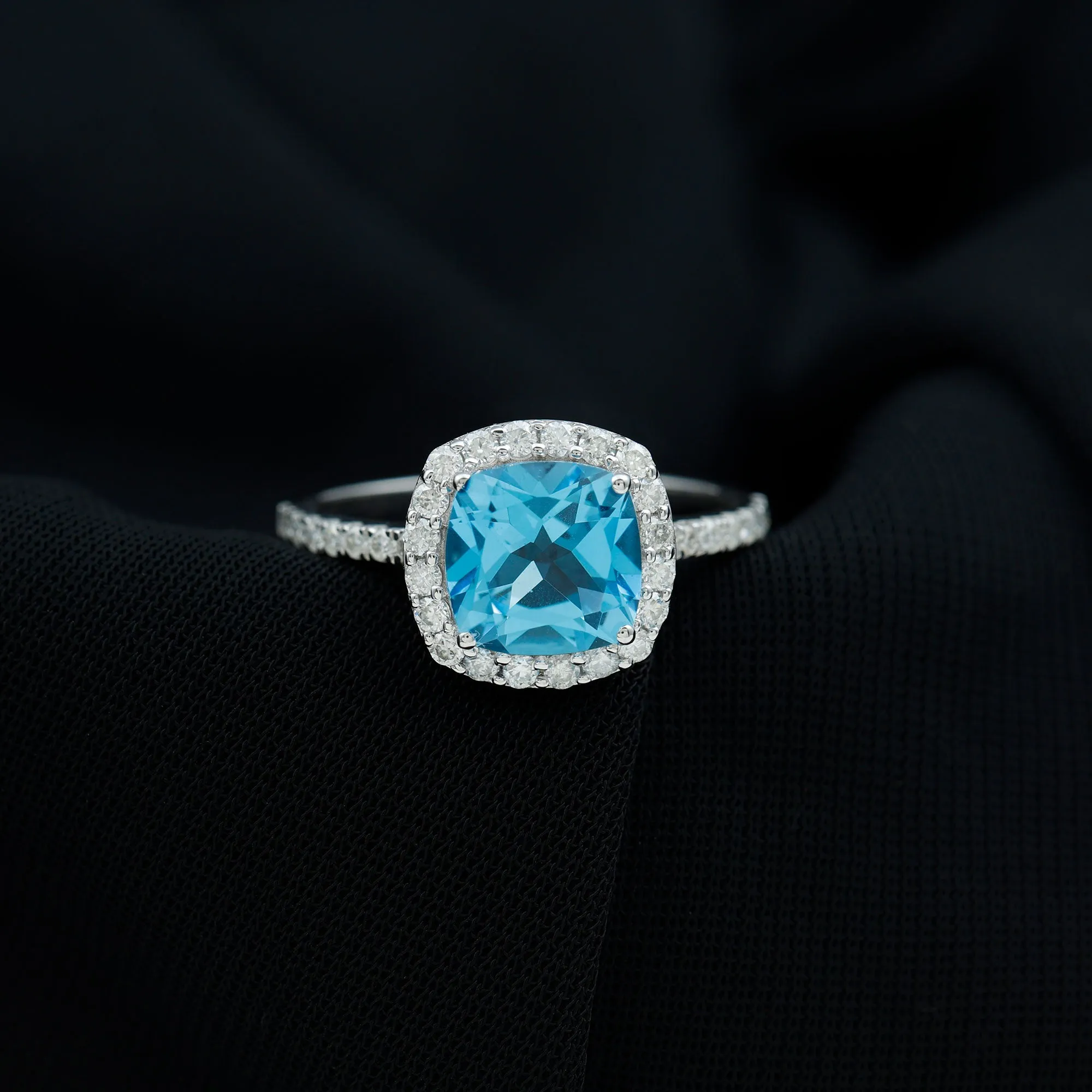 8 MM Cushion Cut Swiss Blue Topaz Solitaire and Diamond Halo Ring