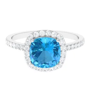 8 MM Cushion Cut Swiss Blue Topaz Solitaire and Diamond Halo Ring