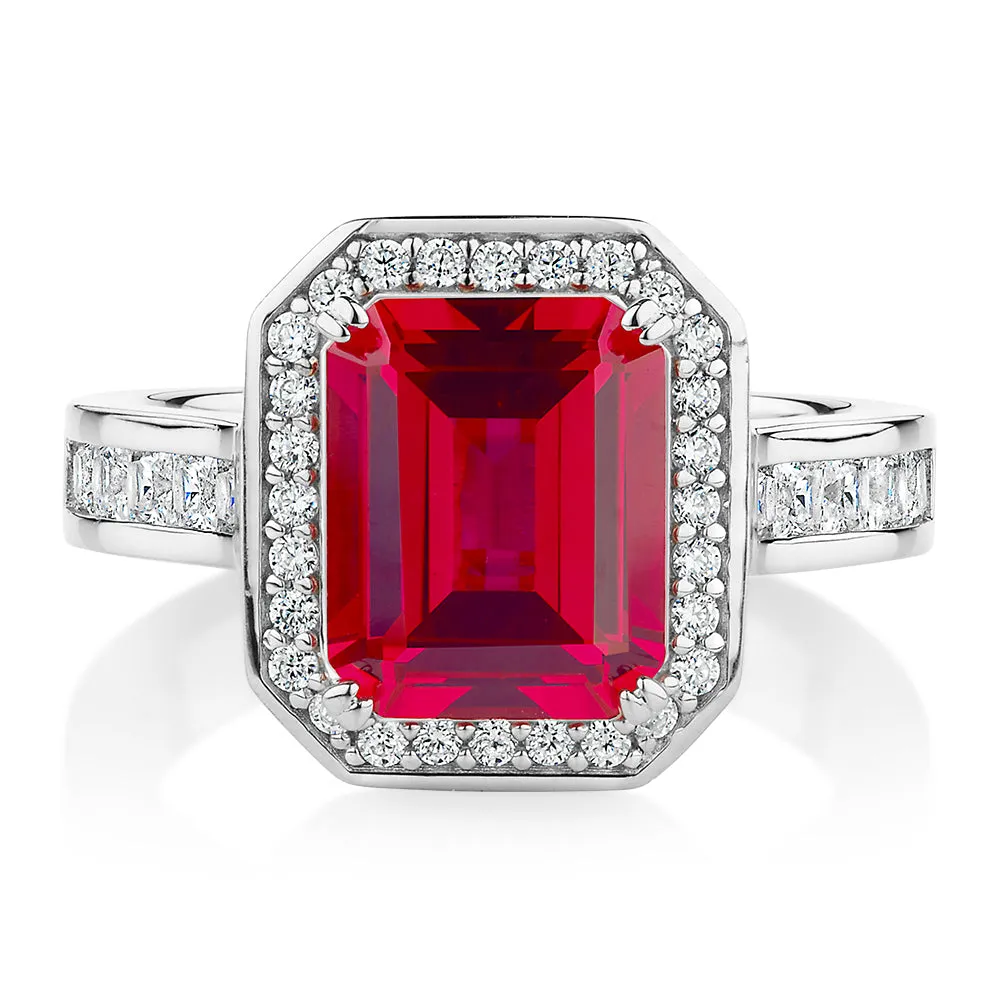 Dress ring with ruby simulant and 0.78 carats* of diamond simulants in sterling silver