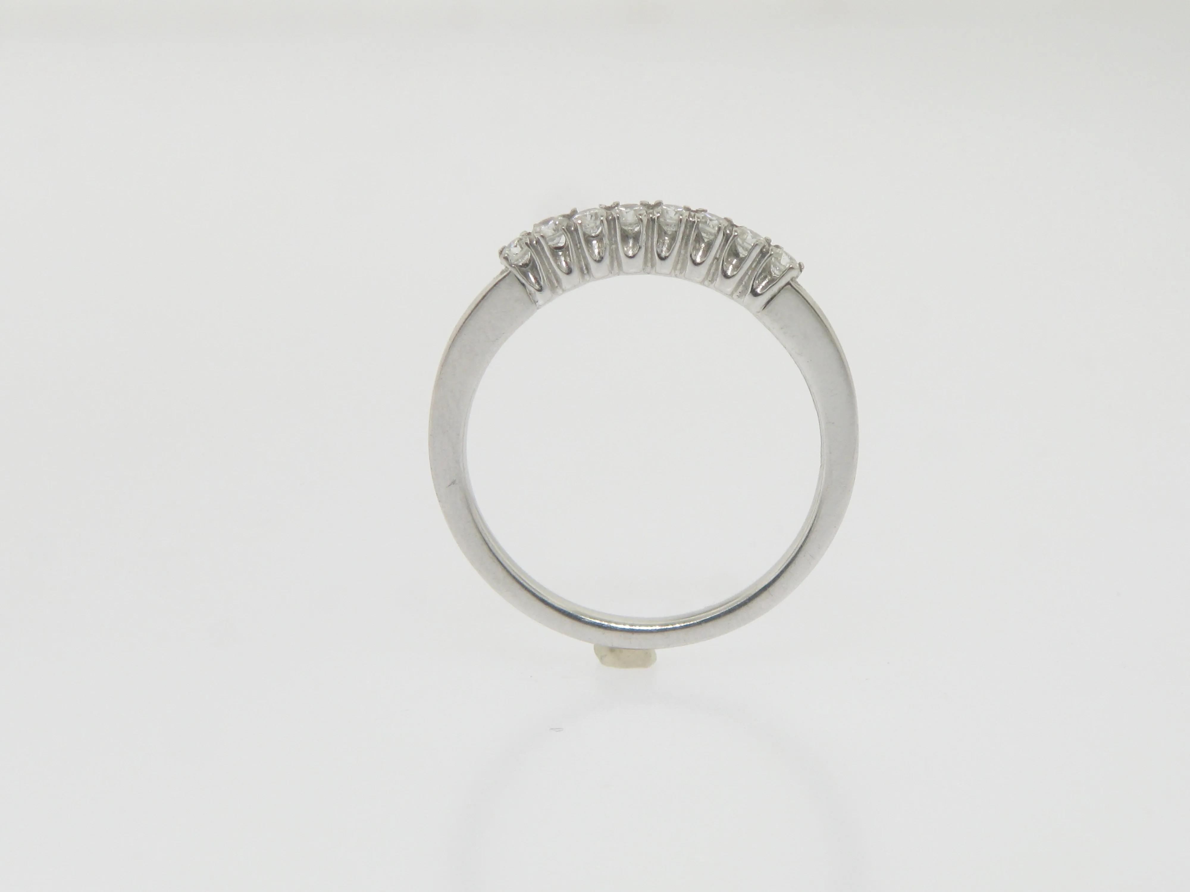 Platinum Curved Diamond Band with 8 Diamonds .28TW Size 6.75 (Brand New)