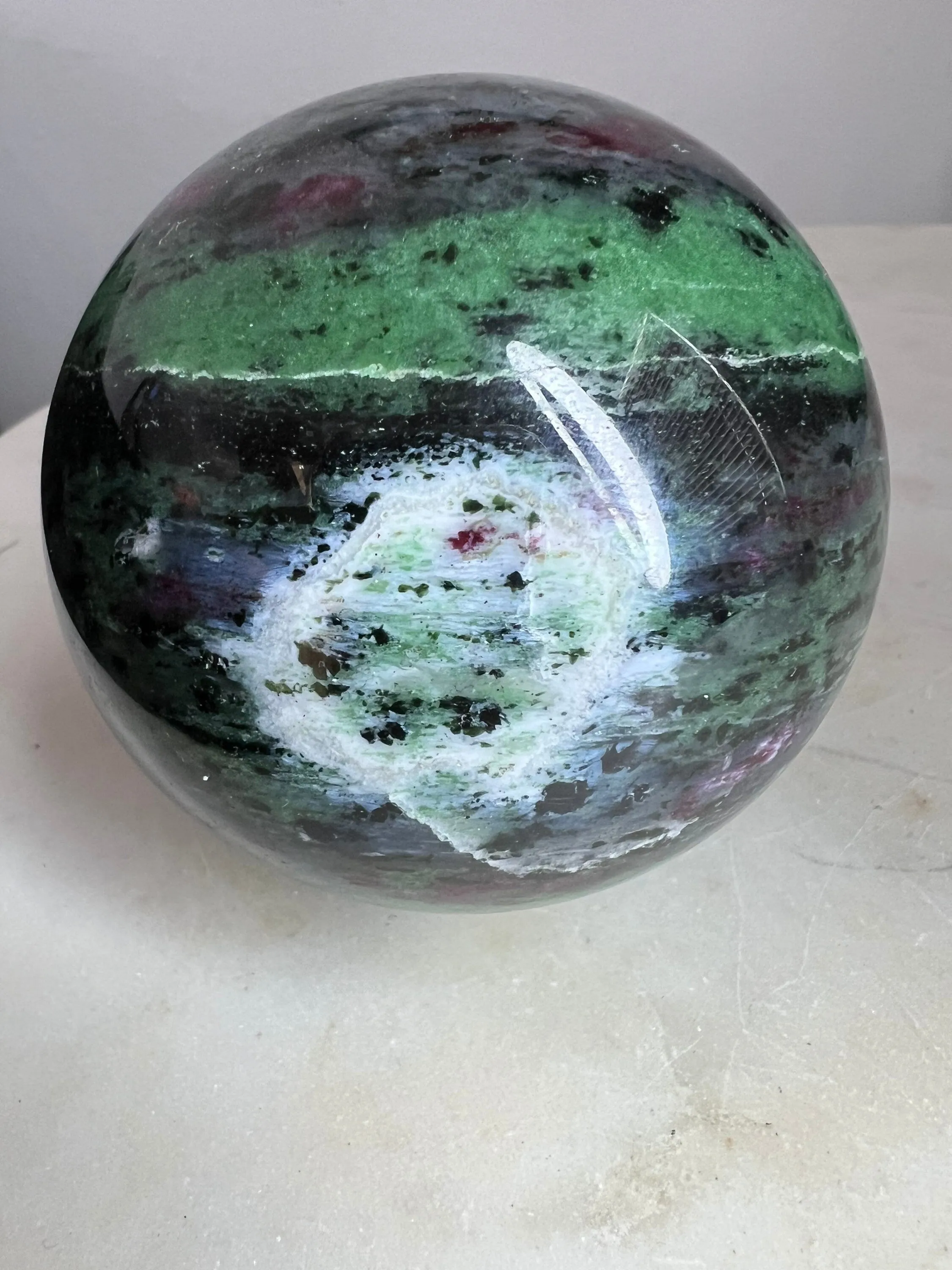 Ruby zoisite sphere 1lb 7oz 76mm