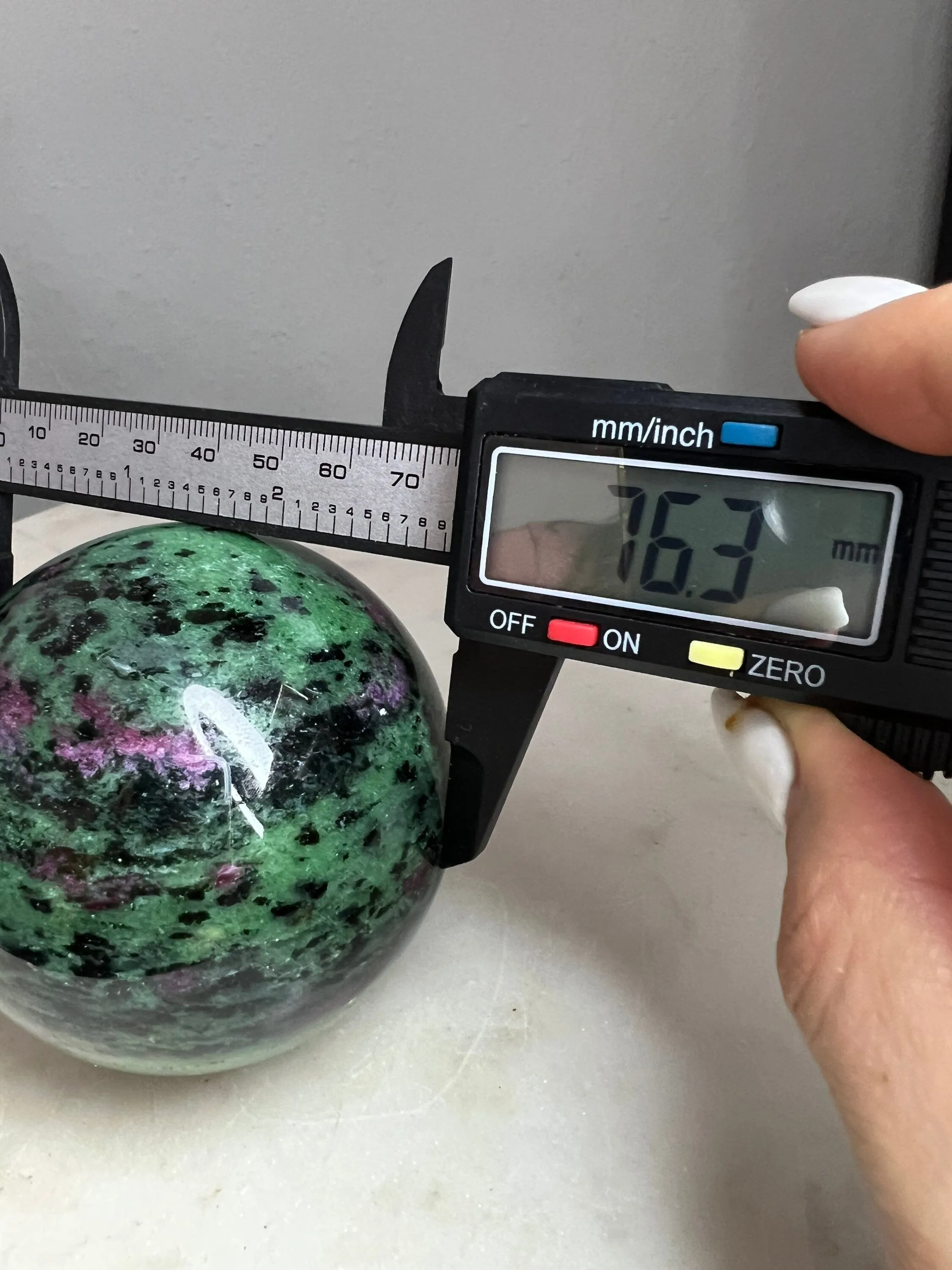 Ruby zoisite sphere 1lb 7oz 76mm