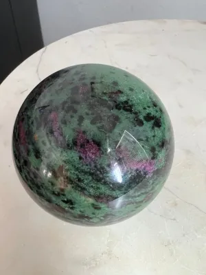 Ruby zoisite sphere 1lb 7oz 76mm